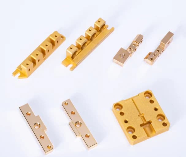 Terminal and electrode components with holes, slots and stepped features