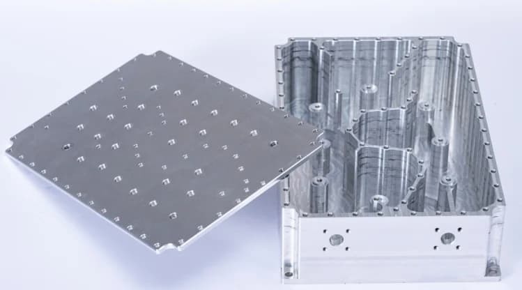 A multi-cavity filter housing with its machined cover plate