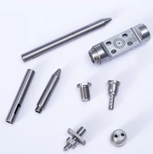Stainless steel shaft, slotted and threaded components
